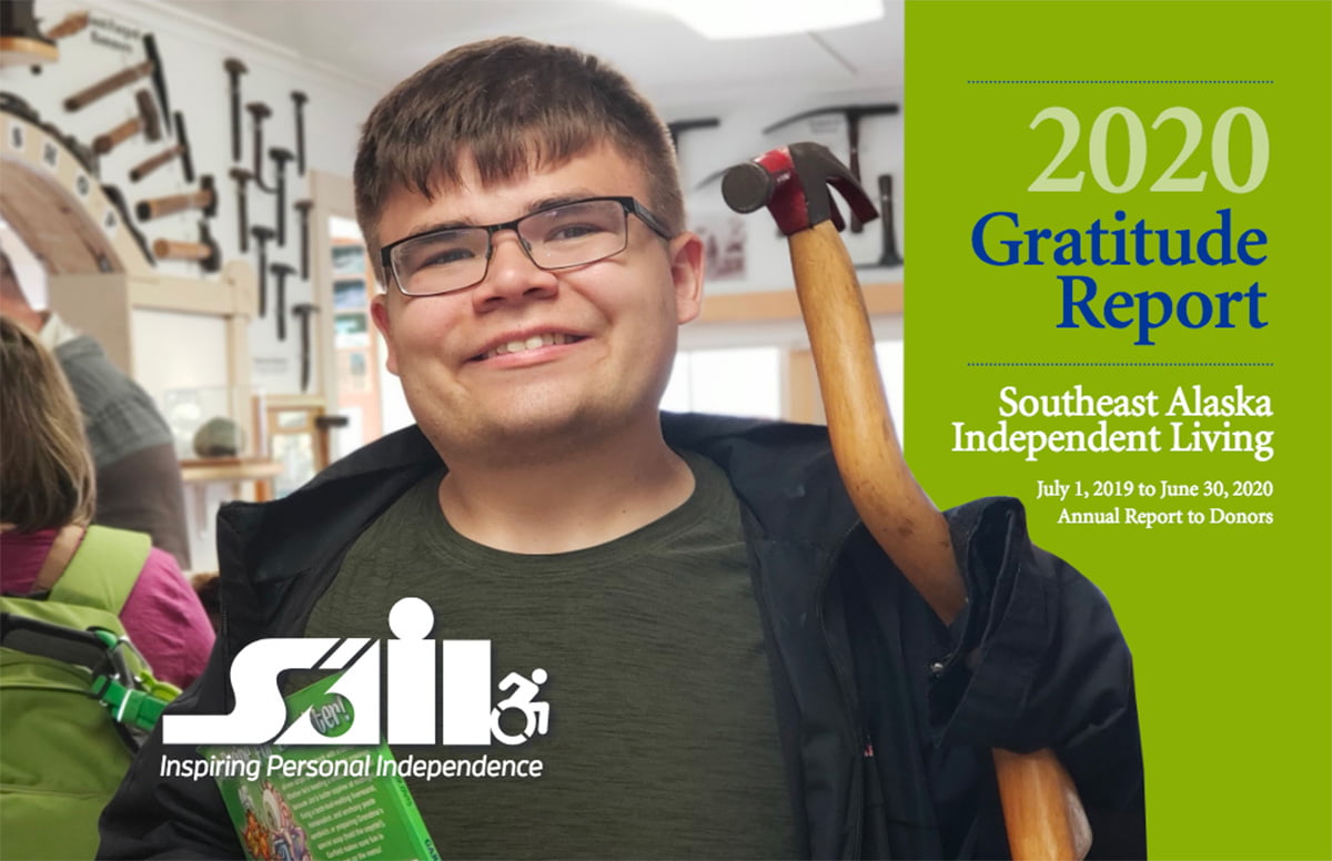 Front page of SAIL's 2020 annual report says 2020 Gratitude Report and has a young man holding a crooked-handled hammer. There is a collection of other picks and hammers on the walls behind him.