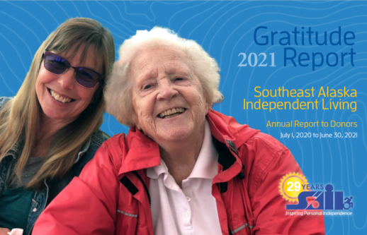 cover of SAIL's 2021 Gratitude Report, two women smiling in front of a blue background. The woman on the left has long blonde hair and is wearing sunglasses, the woman on the right has light grey hair and is wearing a red wind breaker